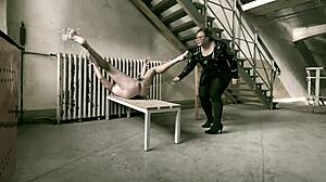 Mistress April's extreme BDSM scene with strap-on action and deepthroat